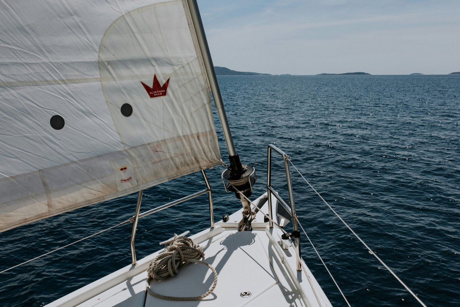 a sailboat sailing on a large body of water